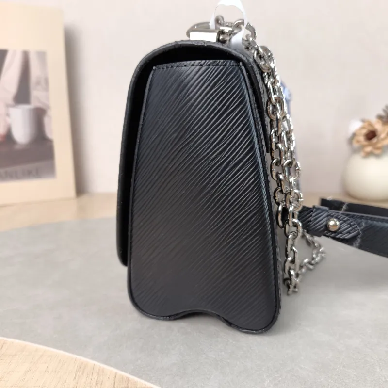 Louis Vuitton Crossbody Bag Twist Black Epi Embossed Calfskin Medium 23 × 9.5 × 17 cm — detail view 10 of 12