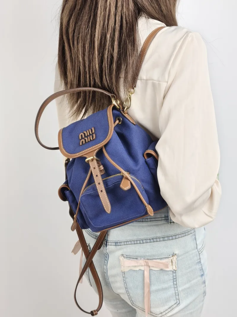 Miumiu Backpack Backpack Blue Brown Canvas Medium 18 × 11.5 × 22 cm — on-model view 1 of 3