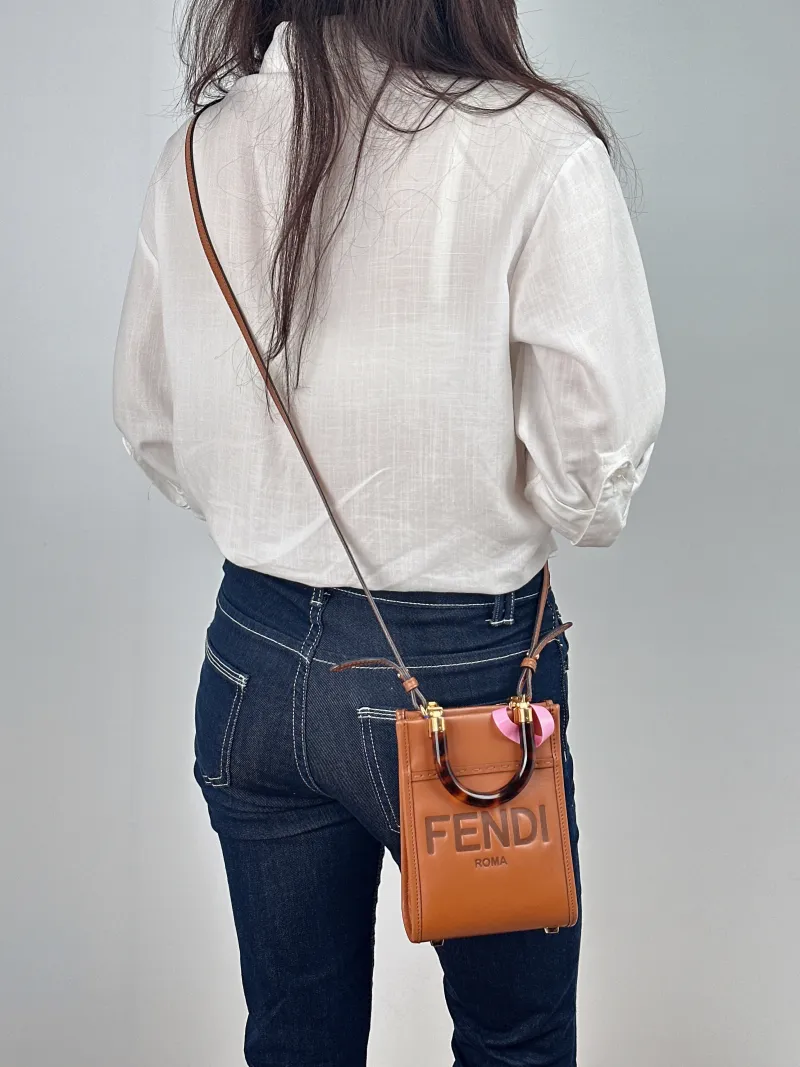 FENDI Crossbody Bag sunshine Caramel Calfskin Mini 13 × 6.5 × 18 cm — on-model view 1 of 2