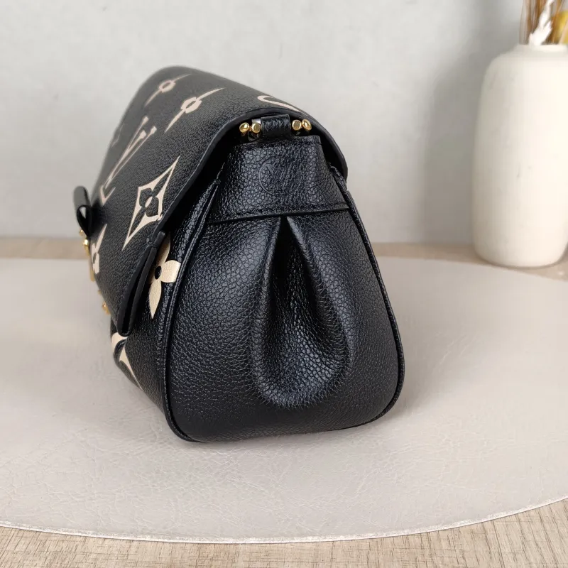 Louis Vuitton Crossbody Bag Favorite Black · White Empreinte Embossed Calfskin Medium 24 × 9 × 14 cm — detail view 10 of 12