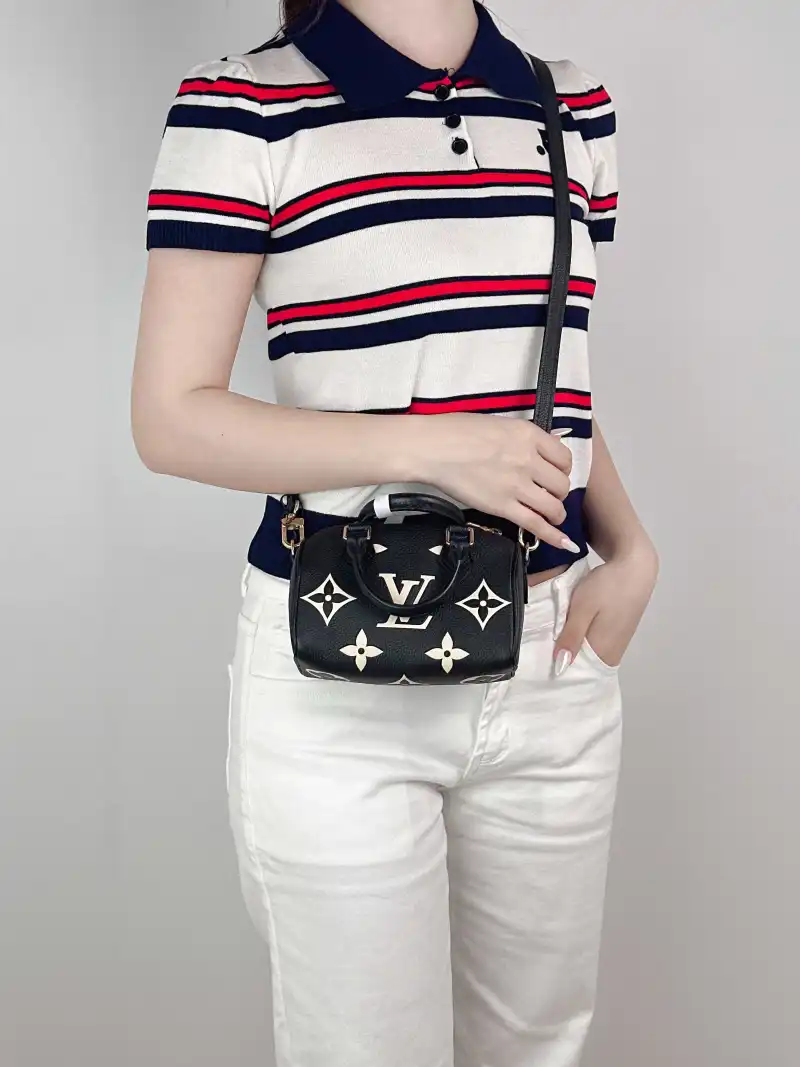 Louis Vuitton Crossbody Bag Speedy Nano Black · White Empreinte Embossed Calfskin nano 16 × 7.5 × 10 cm — on-model view 1 of 3