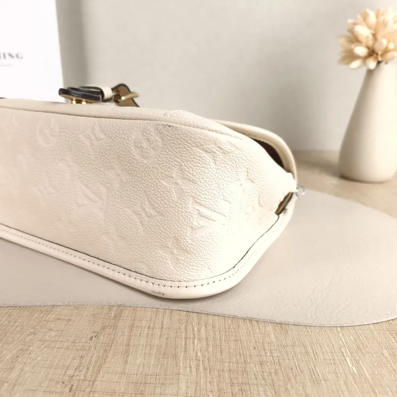 Louis Vuitton Crossbody Bag Diane Baguette Bag White Monogram Empreinte Embossed Calfskin Small 24 × 9 × 15 cm — detail view 3 of 12