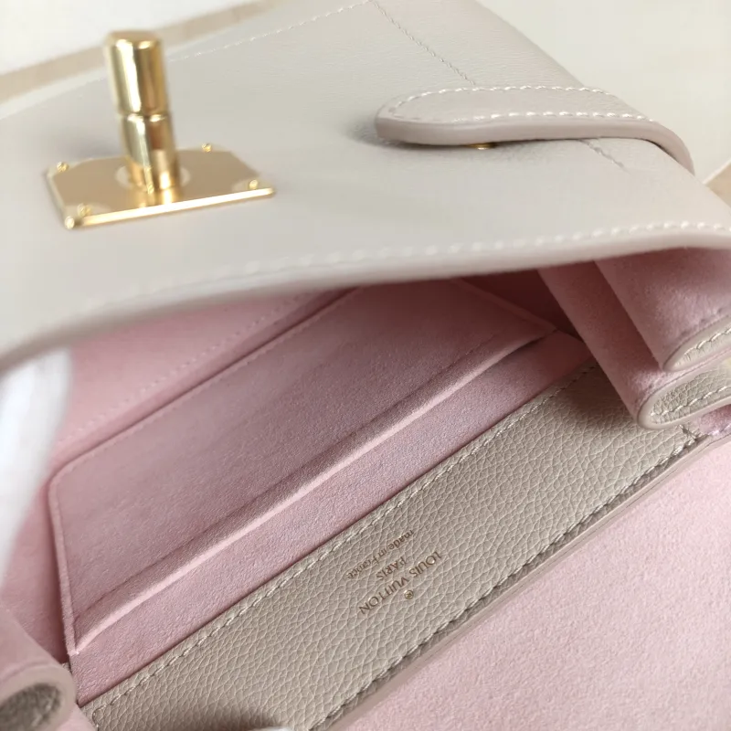 Louis Vuitton Crossbody Bag Lockme Ever Top Handle Bag Calfskin Mini 23 × 10 × 17 cm — detail view 9 of 13