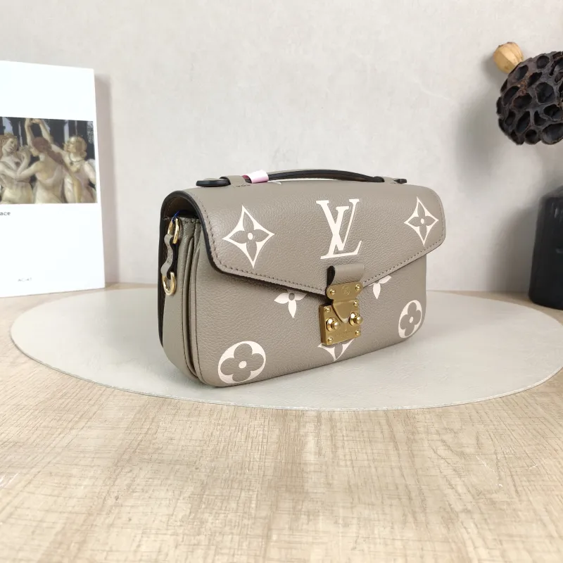 Louis Vuitton Crossbody Bag Pochette Métis East West Monogram Empreinte Embossed Calfskin Small 21.5 × 6 × 13.5 cm — cover view 4 of 5