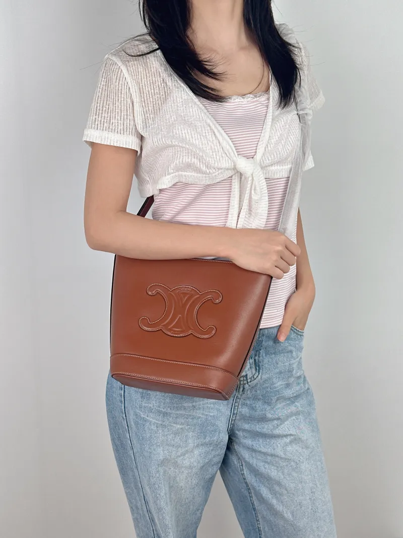 CELINE Shoulder Bag BUCKET TRIOMPHE Bucket Bag Calfskin Small 17 × 10 × 22 cm — on-model view 2 of 2