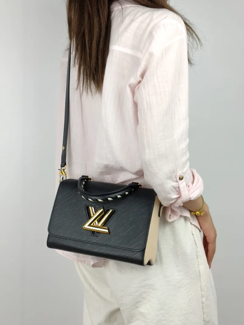 Louis Vuitton Crossbody Bag Crafty Twist Black · White Epi Embossed Calfskin Medium 23 × 9.5 × 17 cm — on-model view 3 of 3