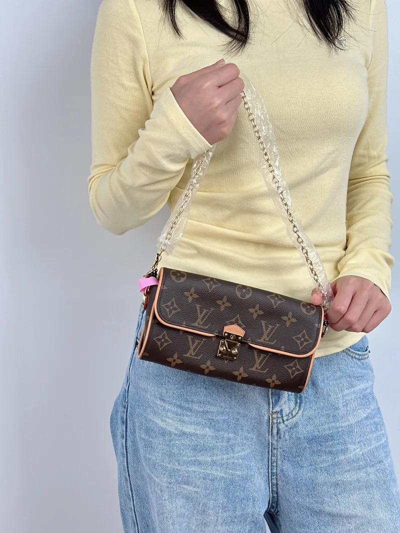 Louis Vuitton Crossbody Bag POCHETTE CAMILLE Monogram PVC One Size 20.5 × 6 × 11 cm — on-model view 2 of 2