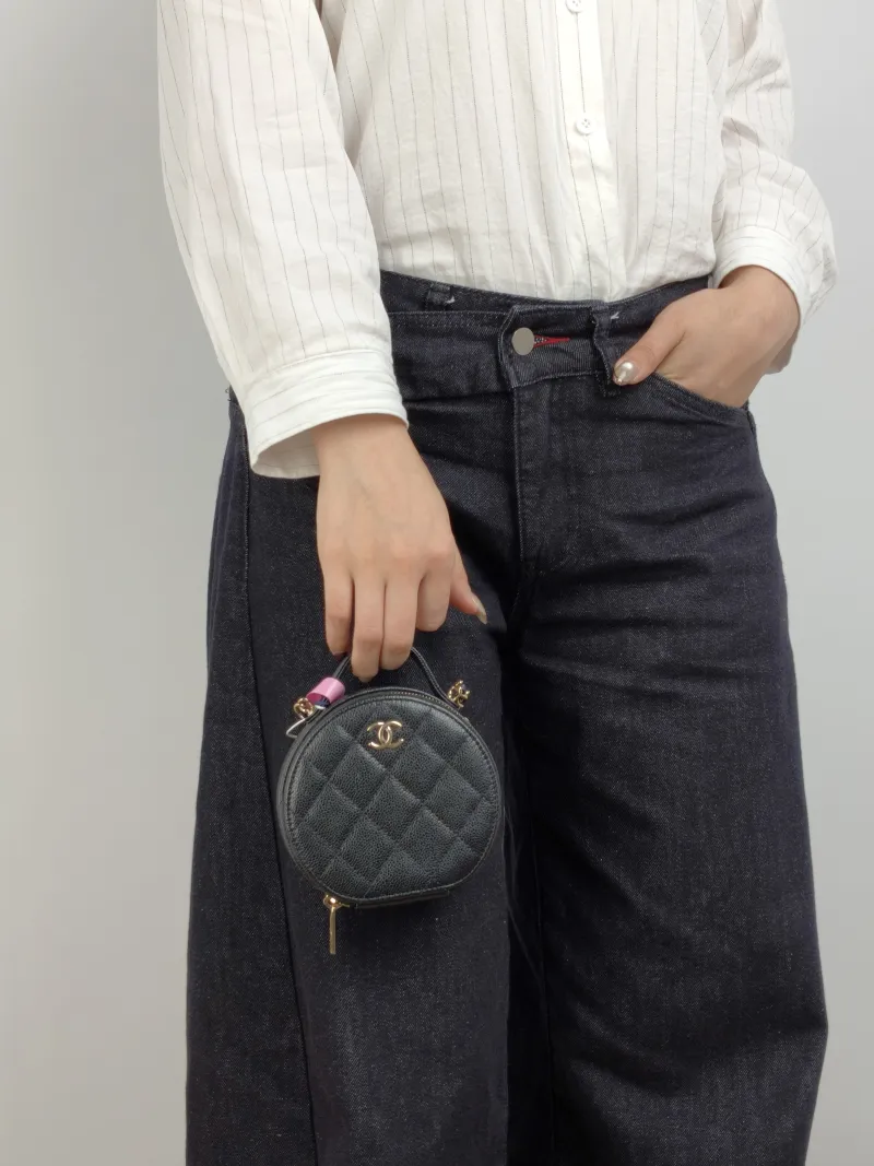Chanel Crossbody Bag Crossbody Bag Black Grained Calfskin 12 × 5.5 × 11 cm 31 — on-model view 2 of 3