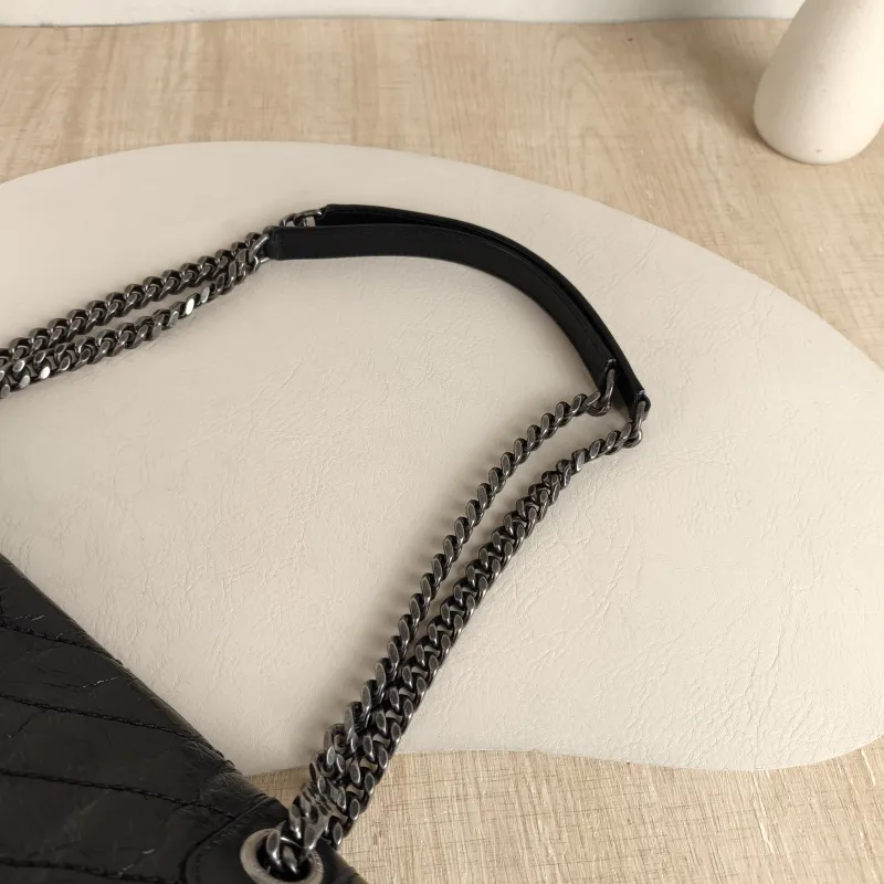 SAINT LAURENT Crossbody Bag Niki D Waxed Leather Calfskin Medium 28 × 8.5 × 20 cm — detail view 12 of 14