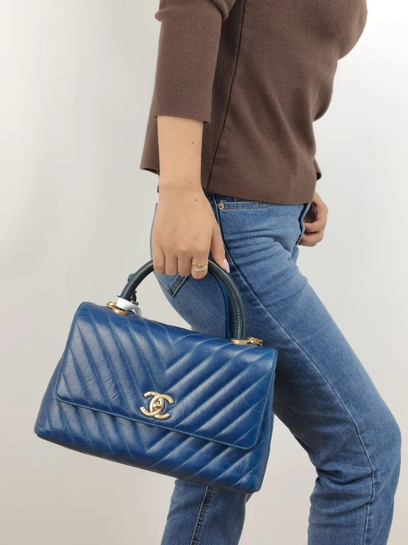 Chanel Top Handle Bag Coco Handle​ Blue V Calfskin Medium 29 × 12 × 18 cm 24 — on-model view 1 of 2