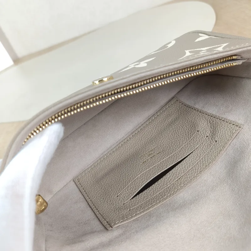 Louis Vuitton Crossbody Bag IVY Monogram Empreinte Embossed Calfskin Small 23.5 × 4.3 × 12 cm — detail view 5 of 13