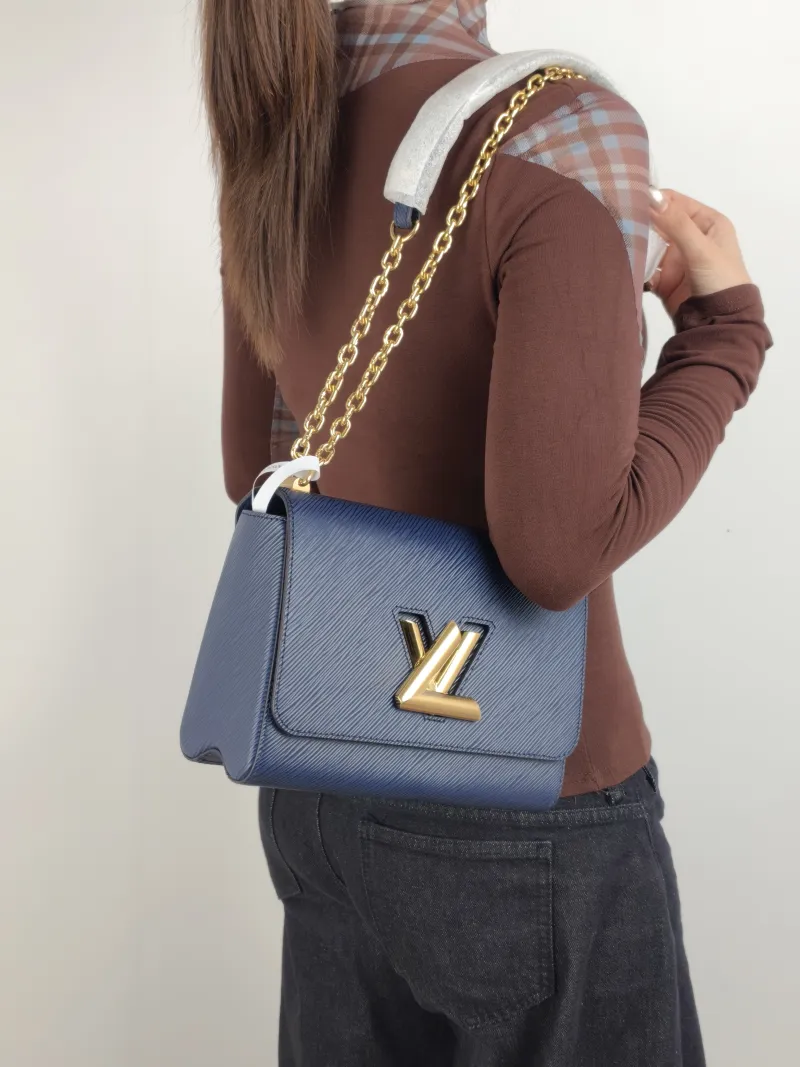 Louis Vuitton Crossbody Bag Twist Navy Epi Embossed Calfskin Medium 23 × 9.5 × 17 cm — on-model view 1 of 2