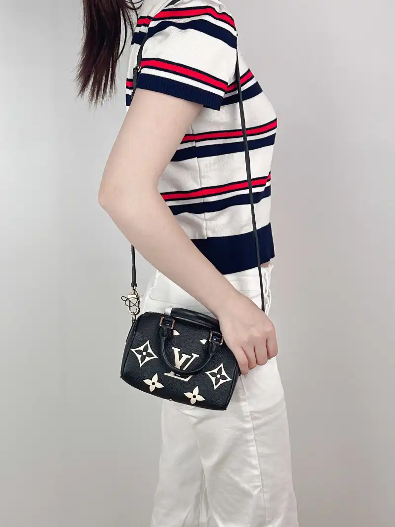 Louis Vuitton Crossbody Bag Speedy Nano Black · White Empreinte Embossed Calfskin nano 16 × 7.5 × 10 cm — on-model view 3 of 3