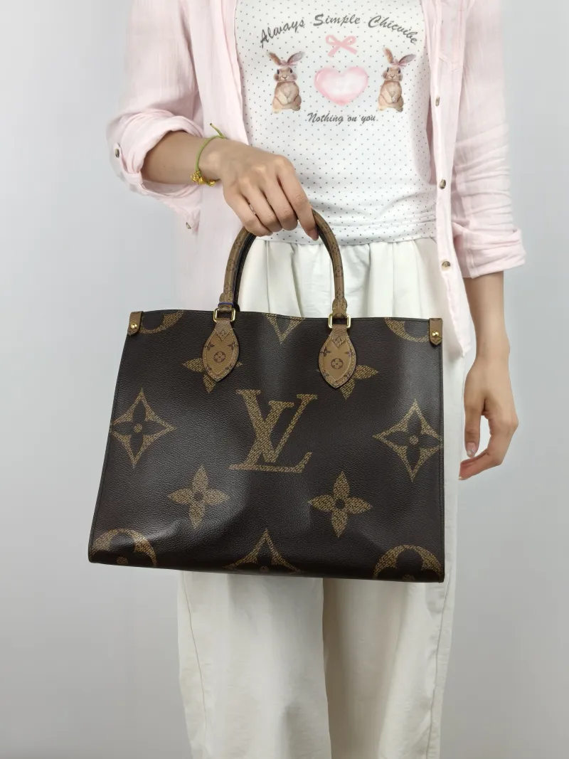Louis Vuitton Shoulder Bag Onthego Medium Monogram PVC Medium 35 × 14 × 27 cm — on-model view 1 of 3