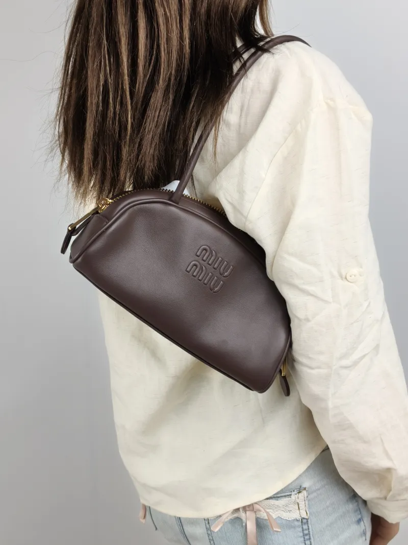 Miumiu Shoulder Bag Beau Calfskin Small 23 × 10 × 11.5 cm — on-model view 1 of 2