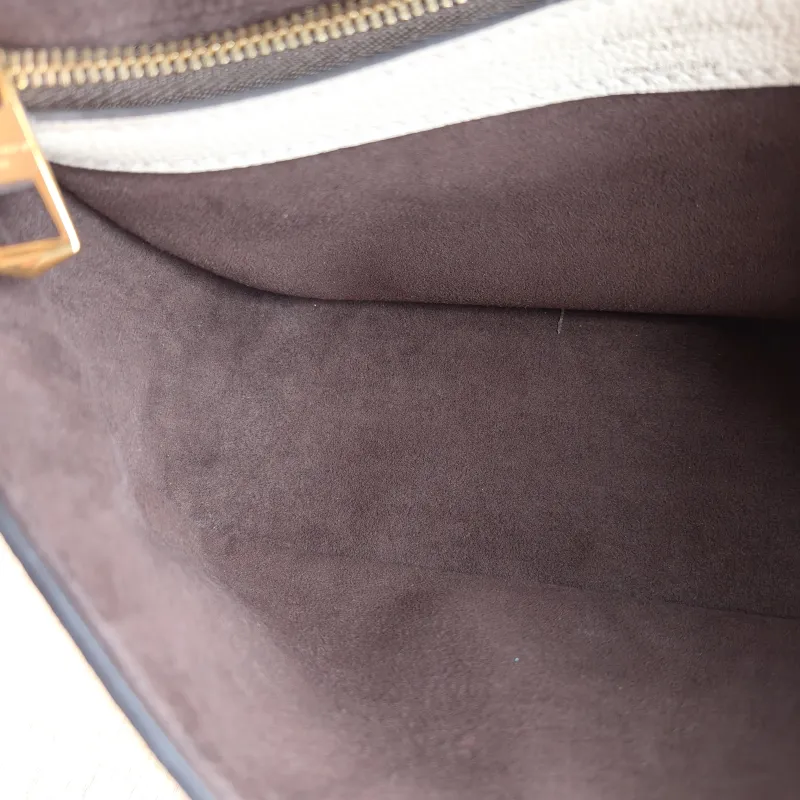 Louis Vuitton Crossbody Bag Diane Baguette Bag White Monogram Empreinte Embossed Calfskin Small 24 × 9 × 15 cm — detail view 9 of 12