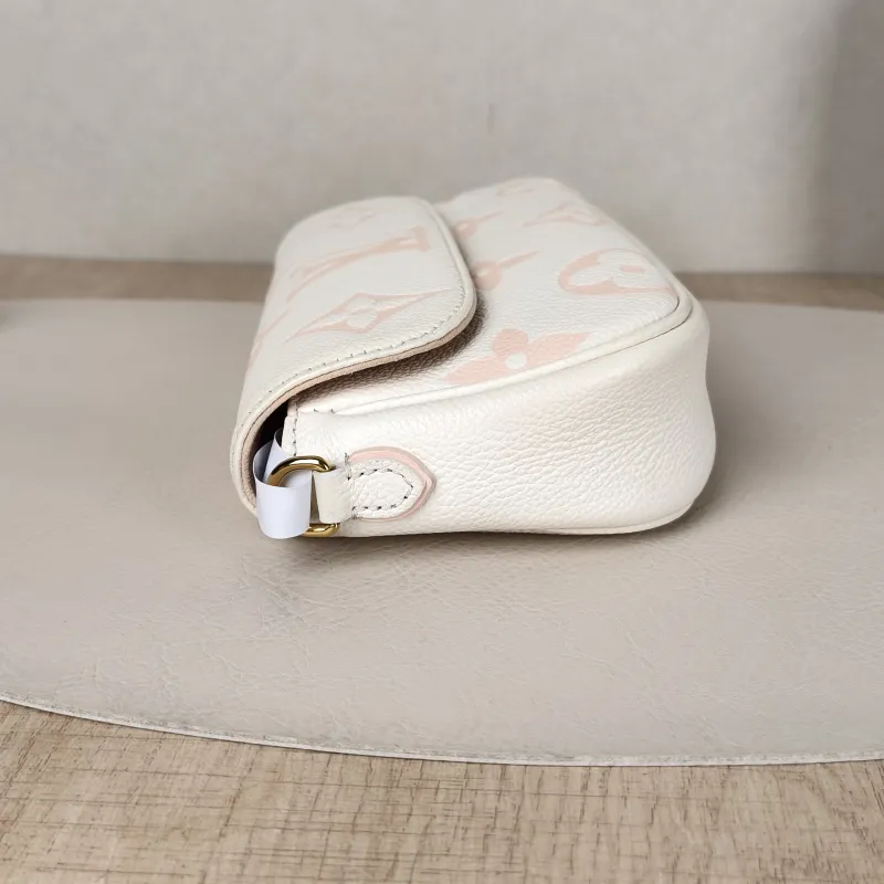 Louis Vuitton Crossbody Bag IVY White · Pink Empreinte Embossed Calfskin Monogram Small23.5 × 4.3 × 12 cm — detail view 10 of 13