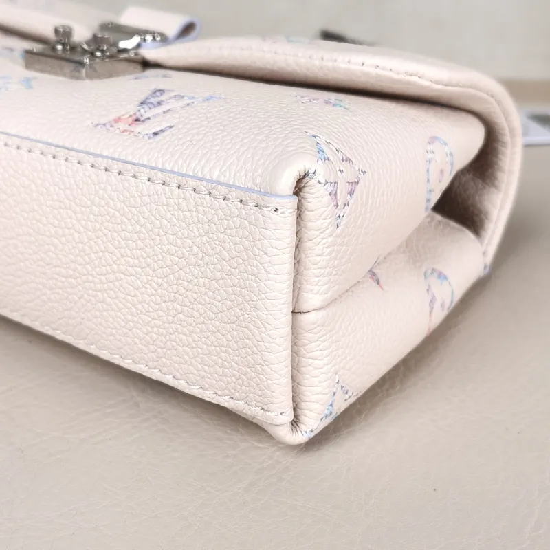 Louis Vuitton Crossbody Bag MADELEINE Calfskin nano 21 × 6 × 12.5 cm — detail view 6 of 12