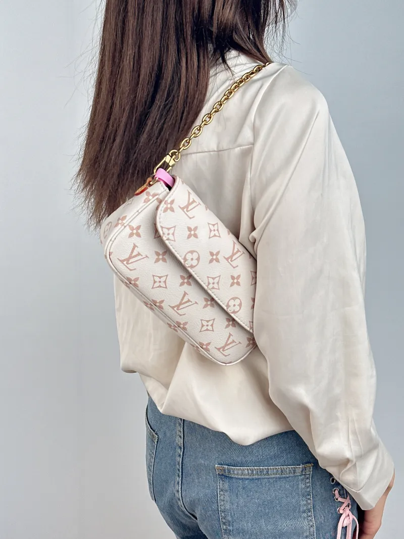 Louis Vuitton Crossbody Bag IVY · Beige PVC Small 23.5 × 4.3 × 12 cm Conditioned — on-model view 2 of 3