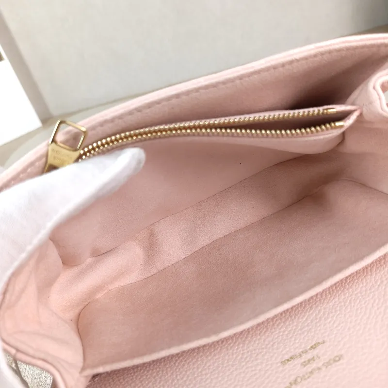 Louis Vuitton Crossbody Bag Pochette Métis East West Monogram Empreinte Embossed Calfskin Small 21.5 × 6 × 13.5 cm — detail view 12 of 12