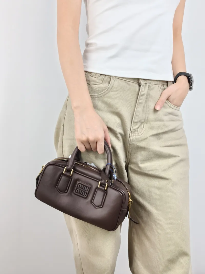 Miumiu Top Handle Bag Arcadie Collection Bowling Bag CC alfskin Medium 22 × 7.5 × 10.5 cm — on-model view 3 of 3