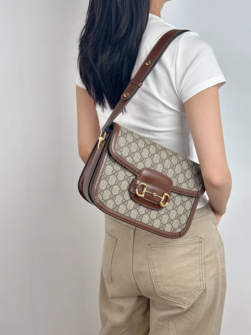 GUCCI Shoulder Bag Horsebit 1955 Horsebit Medium Monogram PVC Medium 25 × 8 × 18 cm — on-model view 1 of 2