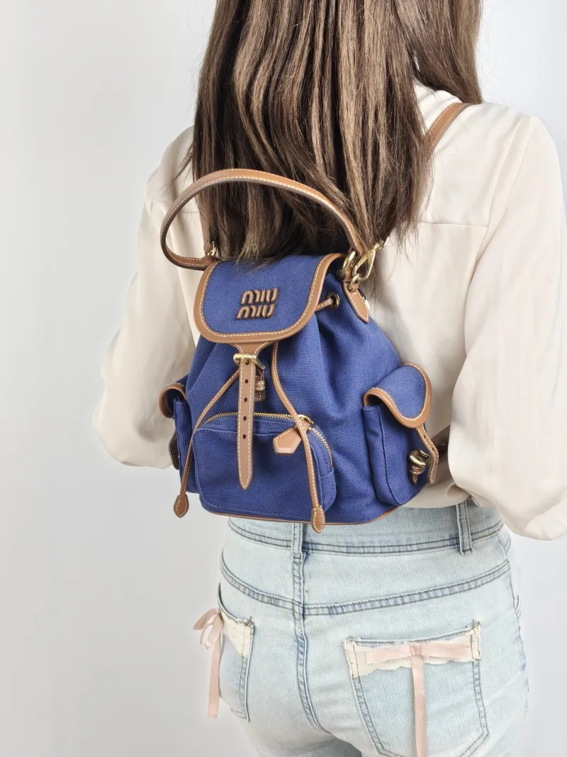 Miumiu Backpack Backpack Blue Brown Canvas Medium 18 × 11.5 × 22 cm — on-model view 3 of 3