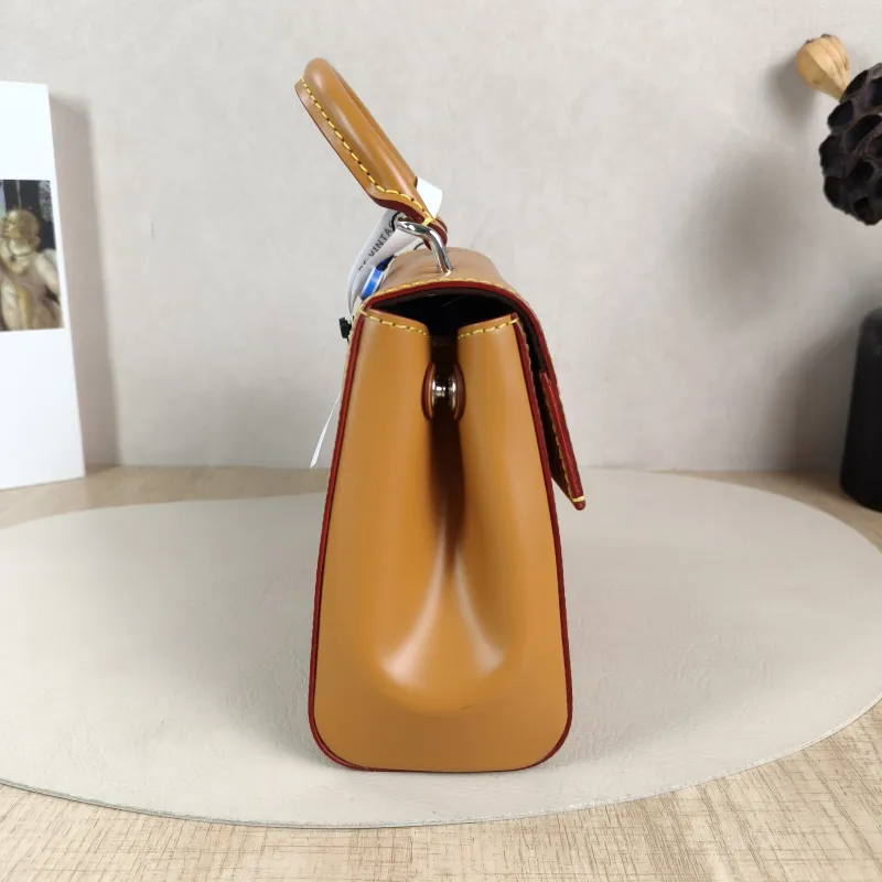 Louis Vuitton Crossbody Bag CLUNY Yellow Epi Embossed Calfskin Mini 20 × 7.5 × 16 cm Leather Tag — detail view 2 of 14