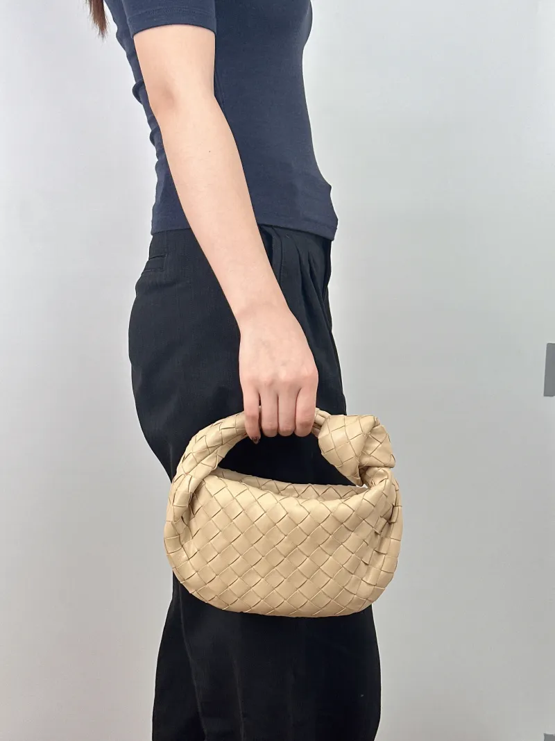 Bottega Veneta Top Handle Bag Jodie Beige Lambskin Mini 28 × 8 × 23 cm — on-model view 2 of 2
