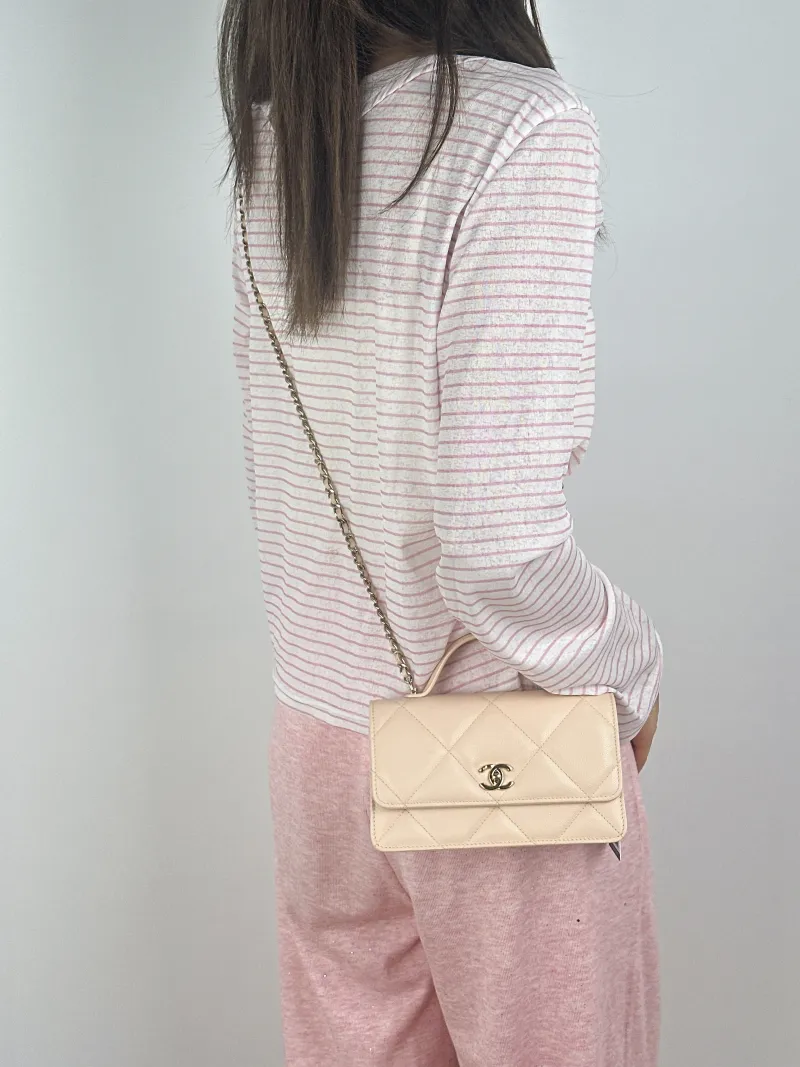 Chanel Crossbody Bag Edition woc Beige Calfskinmini19.2 × 7 × 12.3 cm — on-model view 3 of 3