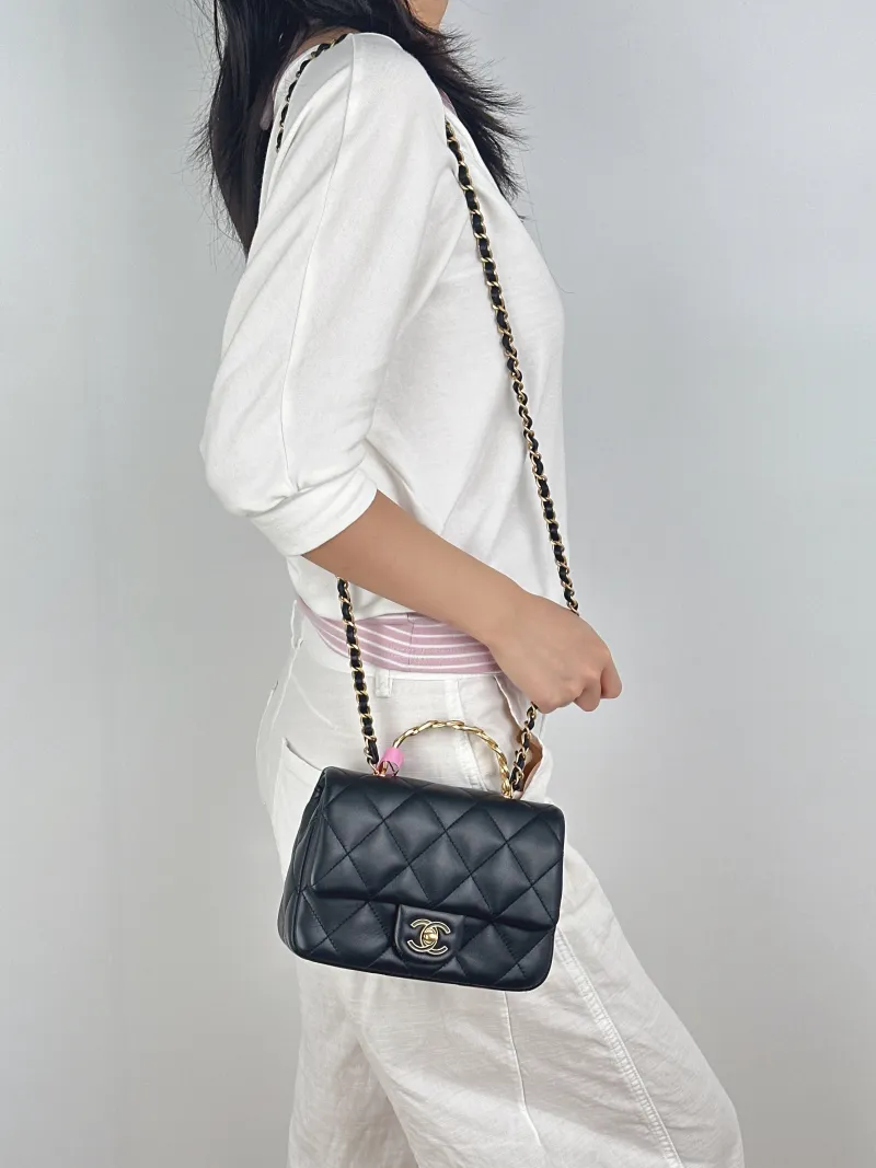 Chanel Crossbody Bag25c Black Lambskin One Size19 × 6 × 14 cm — on-model view 1 of 3