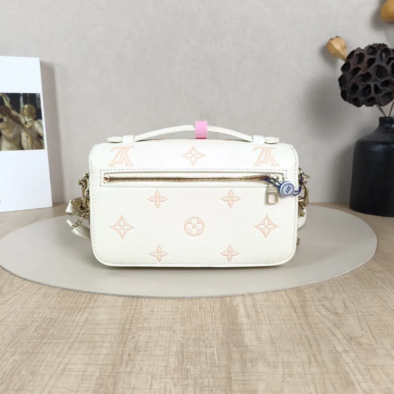 Louis Vuitton Crossbody Bag Pochette Métis East West White · Pink Monogram Empreinte Embossed Calfskin Small21.5 × 6 × 13.5 cm — cover view 4 of 5
