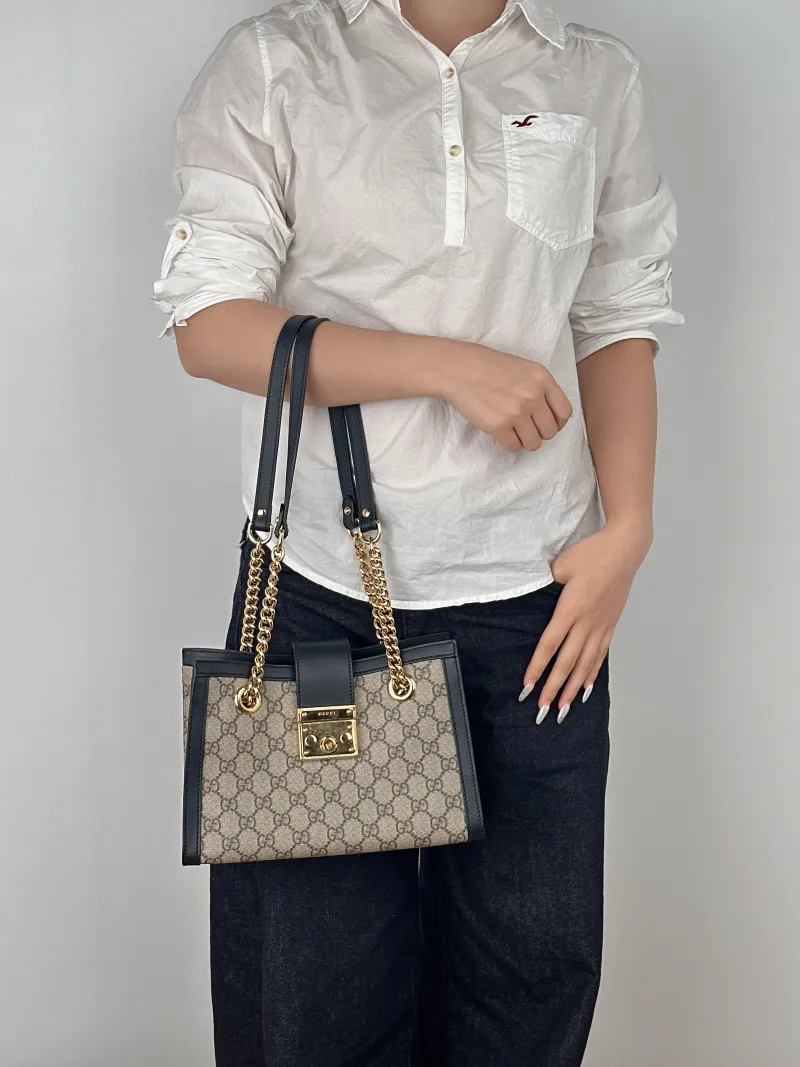GUCCI Shoulder Bag Padlock Tote Black Monogram PVC Medium26 × 10 × 18 cm — on-model view 1 of 2