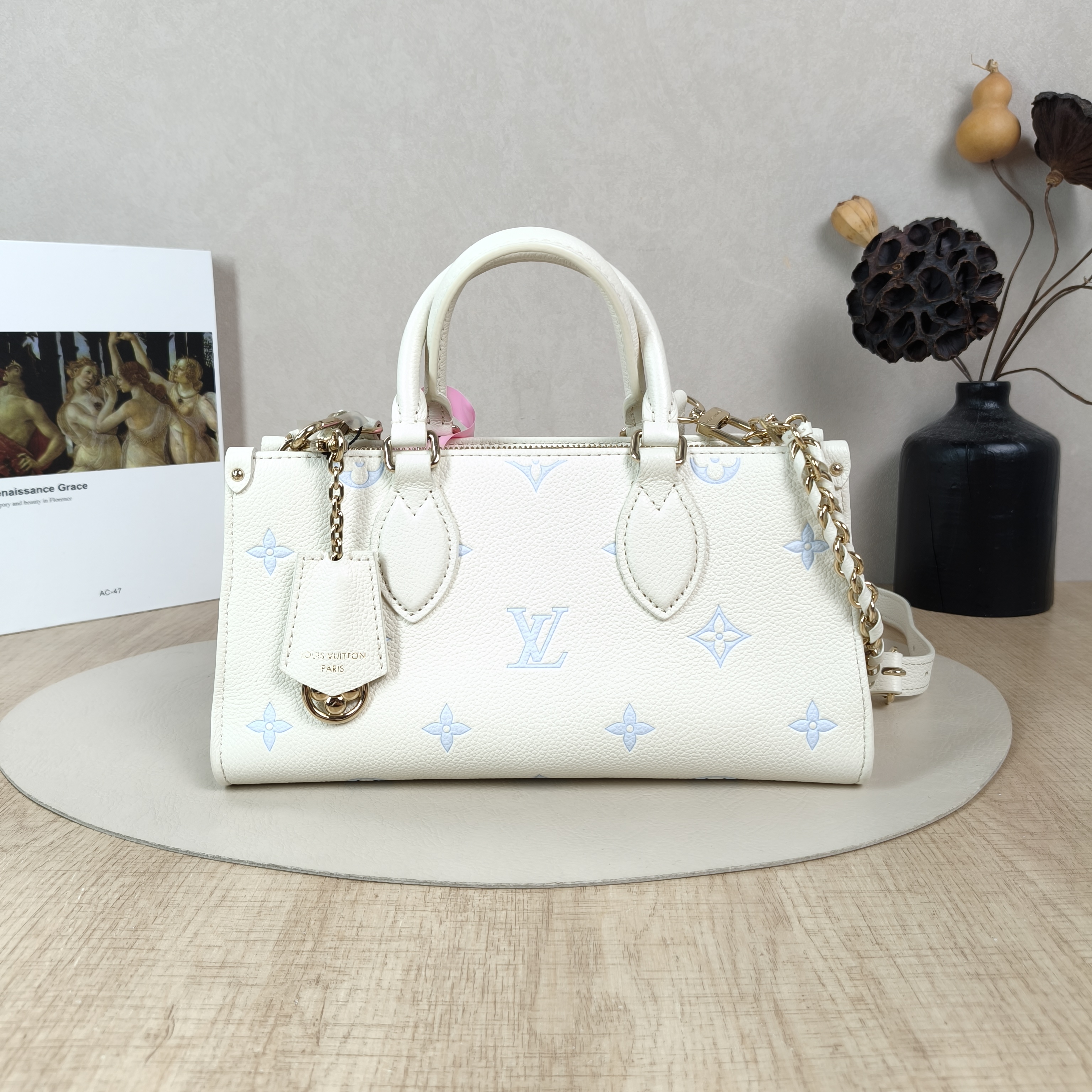 Louis Vuitton Crossbody Bag Onthego East West Two Straps White · Blue Empreinte Embossed Calfskin Monogram Small25 × 10 × 13 cm