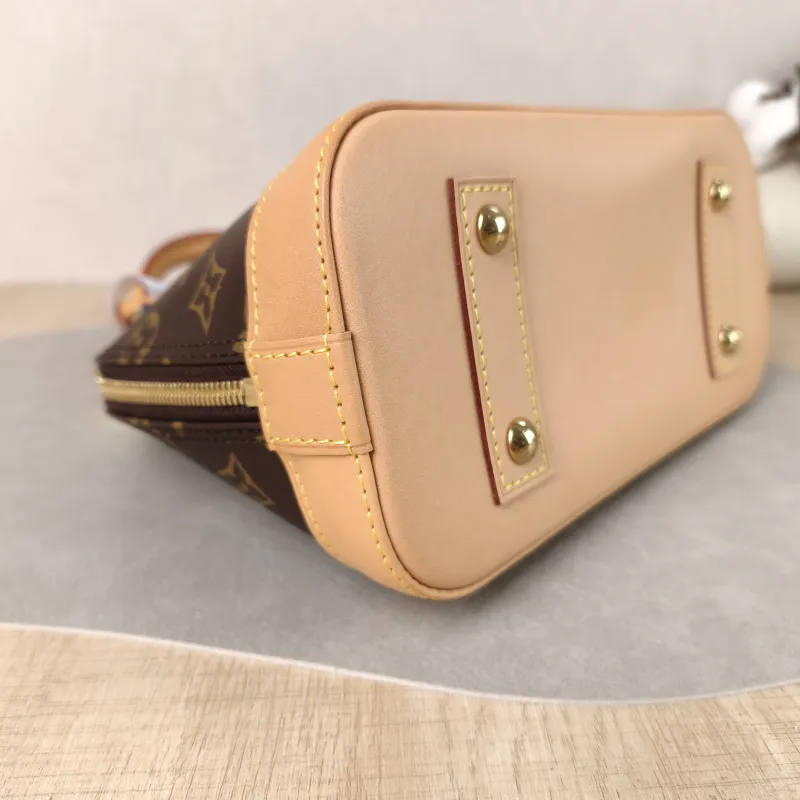 Louis Vuitton Crossbody Bag Alma BB Monogram PVC BB 23.5 × 11.5 × 17.5 cm — detail view 7 of 12