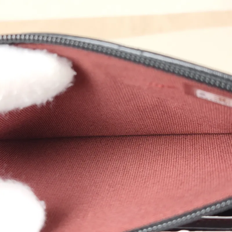 Chanel Crossbody Bag22b woc Black Lambskin15.5 × 4.5 × 11 cm — detail view 1 of 12