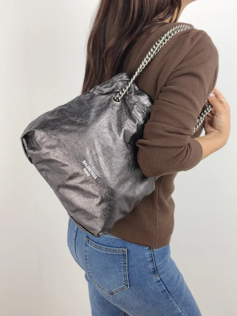 BALENCIAGA Shoulder Bag Crush Calfskin Small 25 × 9 × 26 cm — on-model view 2 of 2