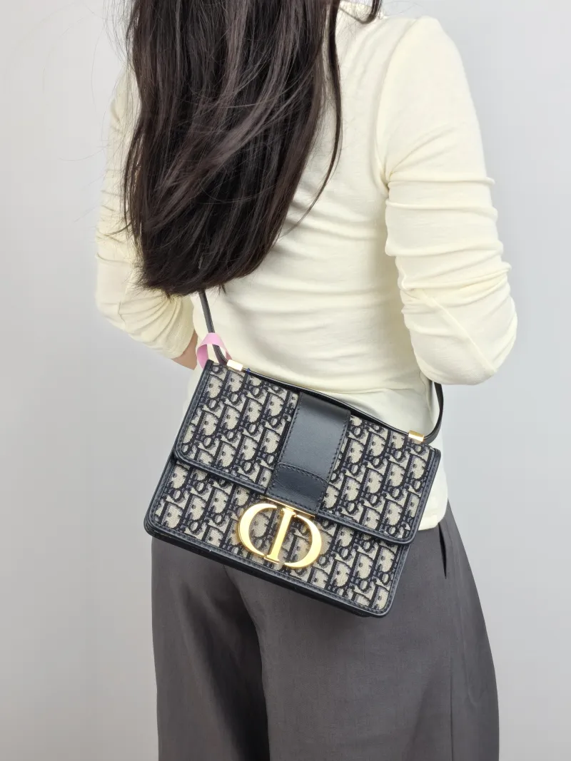 DIOR Crossbody Bag 30Montaigne 30 Edition Canvas Medium 24 × 8 × 17 cm — on-model view 1 of 2
