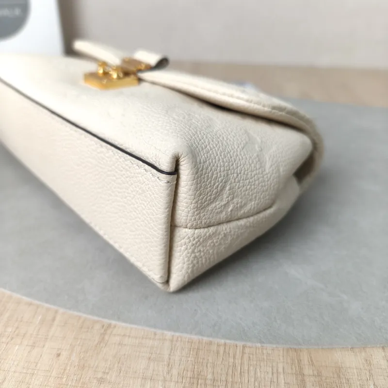 Louis Vuitton Crossbody Bag MADELEINE White Empreinte Embossed Calfskinnano21 × 6 × 12.5 cm — detail view 6 of 14