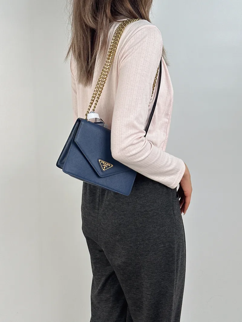 PRADA Crossbody Bag Crossbody Bag Clutch Blue Calfskin One Size20 × 7 × 14 cm — on-model view 1 of 2