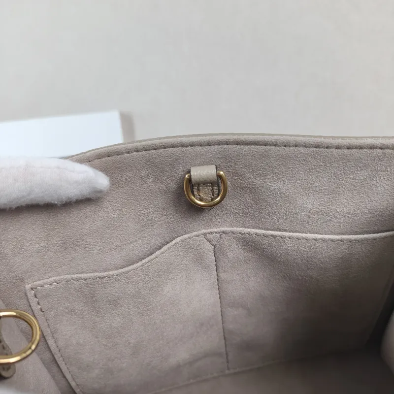 Louis Vuitton Shoulder Bag Onthego · White Monogram Empreinte Embossed Calfskin Small 25 × 11.5 × 19 cm — detail view 2 of 10