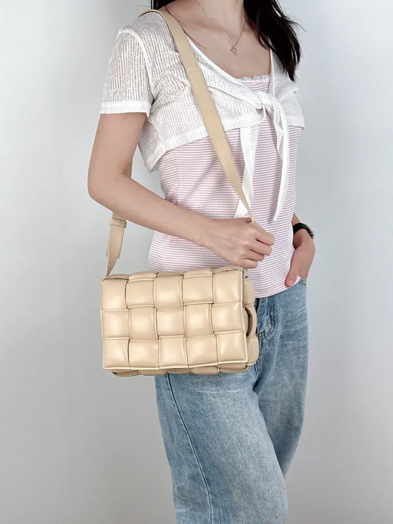 Bottega Veneta Crossbody Bag Padded Cassette Woven Lambskin Medium26 × 8 × 18 cm — on-model view 1 of 2