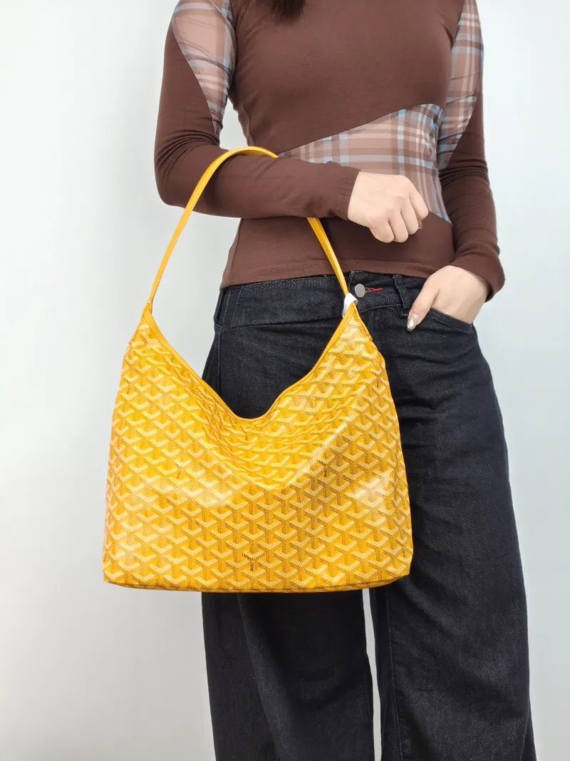 GOYARD Shoulder Bag Boheme Hobo​ Yellow PVC Small 43 × 14 × 27 cm — on-model view 1 of 2
