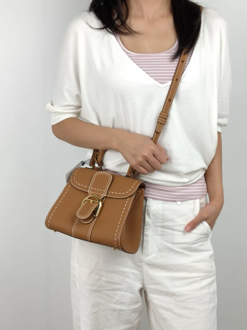 DELVAUX Crossbody Bag Brillant Caramel Calfskin Mini 20 × 11 × 16 cm — on-model view 1 of 3