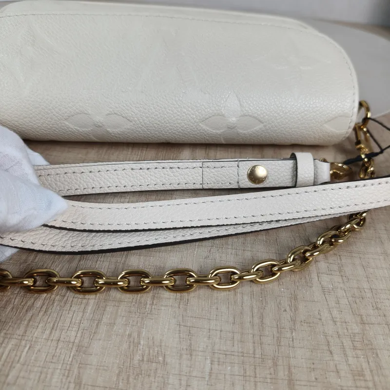 Louis Vuitton Crossbody Bag IVY White Monogram Empreinte Embossed Calfskin Small 23.5 × 4.3 × 12 cm — detail view 8 of 11