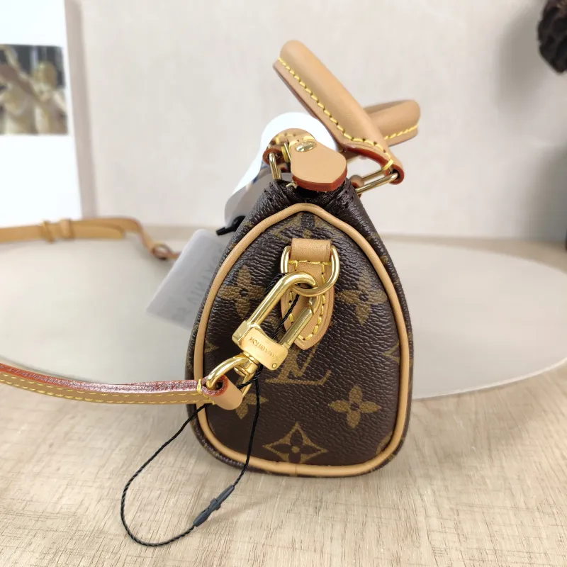 Louis Vuitton Crossbody Bag Speedy Nano Shoulder Strap PVC nano 16 × 7.5 × 10 cm — detail view 1 of 11