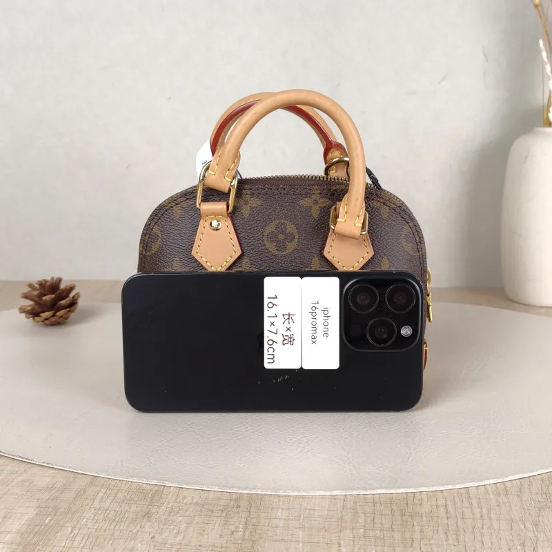 Louis Vuitton Crossbody Bag Alma Nano Monogram PVC nano 18 × 8 × 12 cm — cover view 5 of 5