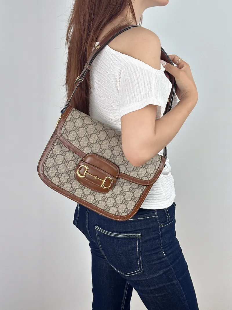 GUCCI Shoulder Bag Horsebit 1955 Horsebit Medium Monogram PVC Medium25 × 8 × 18 cm — on-model view 1 of 2