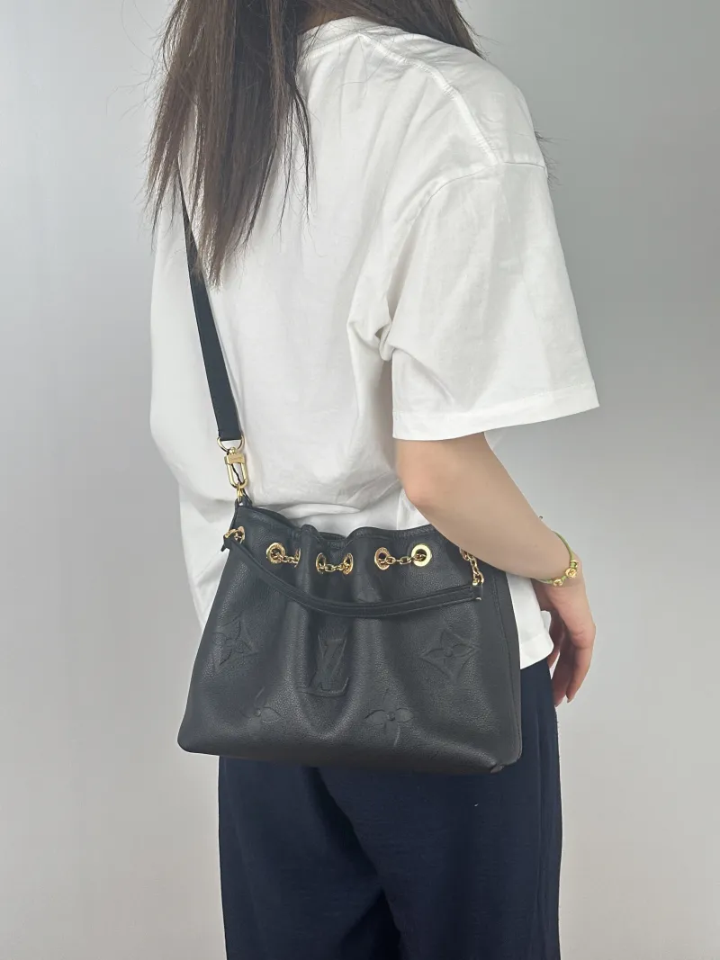 Louis Vuitton Crossbody Bag BUNDLE Black Empreinte Embossed Calfskin Monogram Medium28 × 11.5 × 20 cm — on-model view 1 of 2