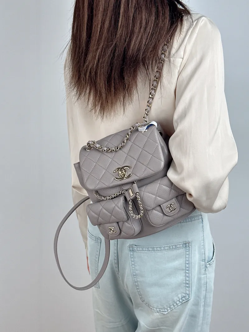 Chanel Backpack Duma Grey Grained Calfskin Medium 20.5 × 11.5 × 20 cm — on-model view 1 of 2